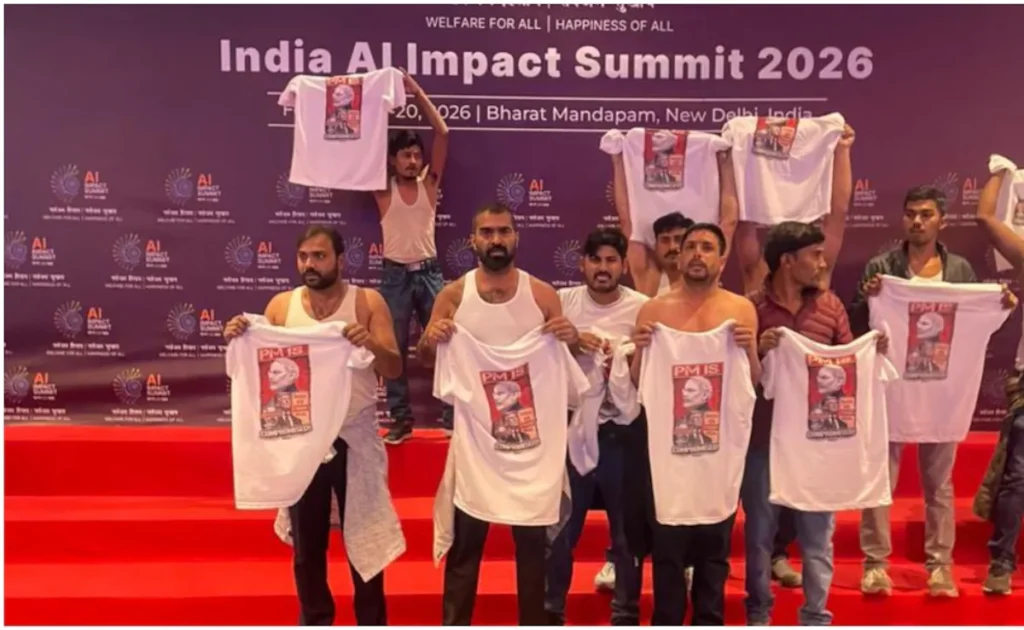 Youth Congress activists protest shirtless inside Hall No. 5 at AI Summit Bharat Mandapam