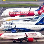 Passengers wait at Delhi airport after Middle East conflict causes India airline flight cancellations